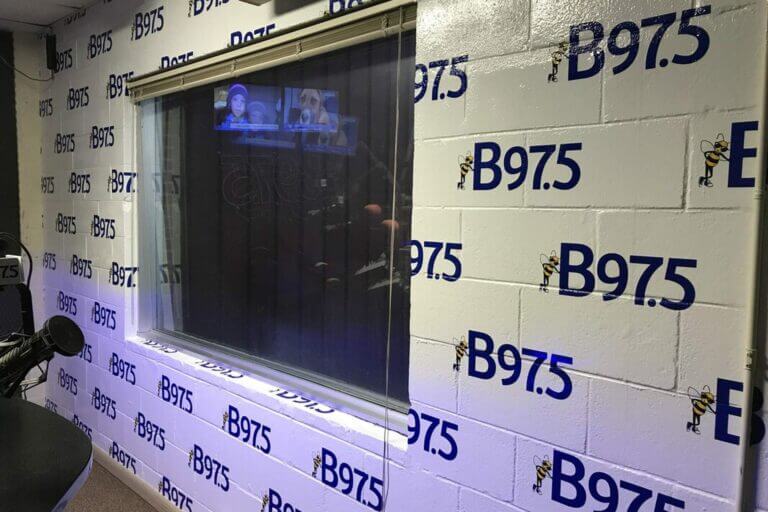 B97.5